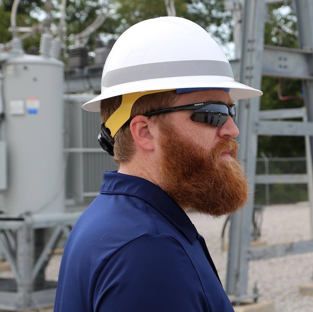Seth Jones, CoopTools founder, at a distribution substation